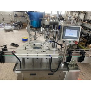 AUTOMATIC ROTARY CAPPING MACHINE