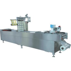 AUTOMATIC VACUUM FORMING MACHINE